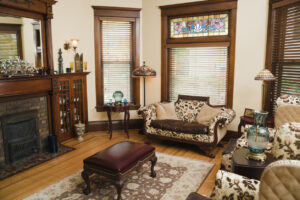 Living room featuring a stylish fireplace and unique decor elements, creating a warm and inviting atmosphere.