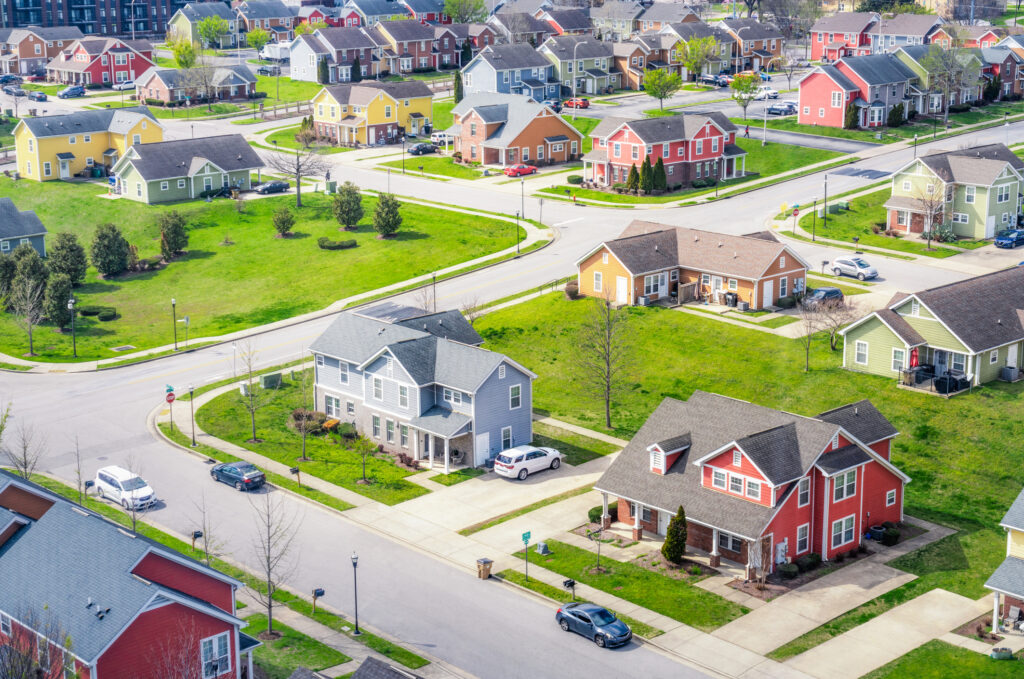 An isometric angled view of a housing development in Nashville, with large detached houses in different colors.