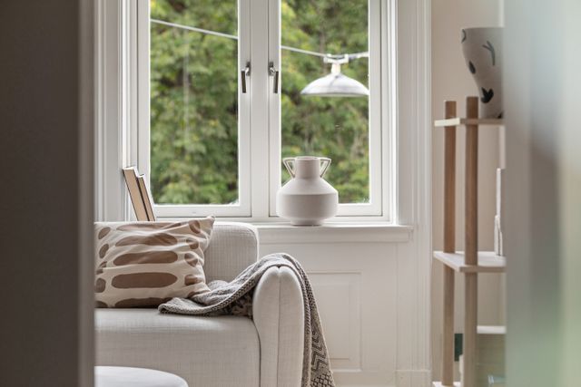 living room with a sofa and window