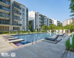 Modern residential buildings with outdoor facilities.