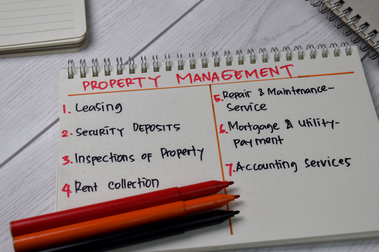 Property Management Services Written Out in a Notebook