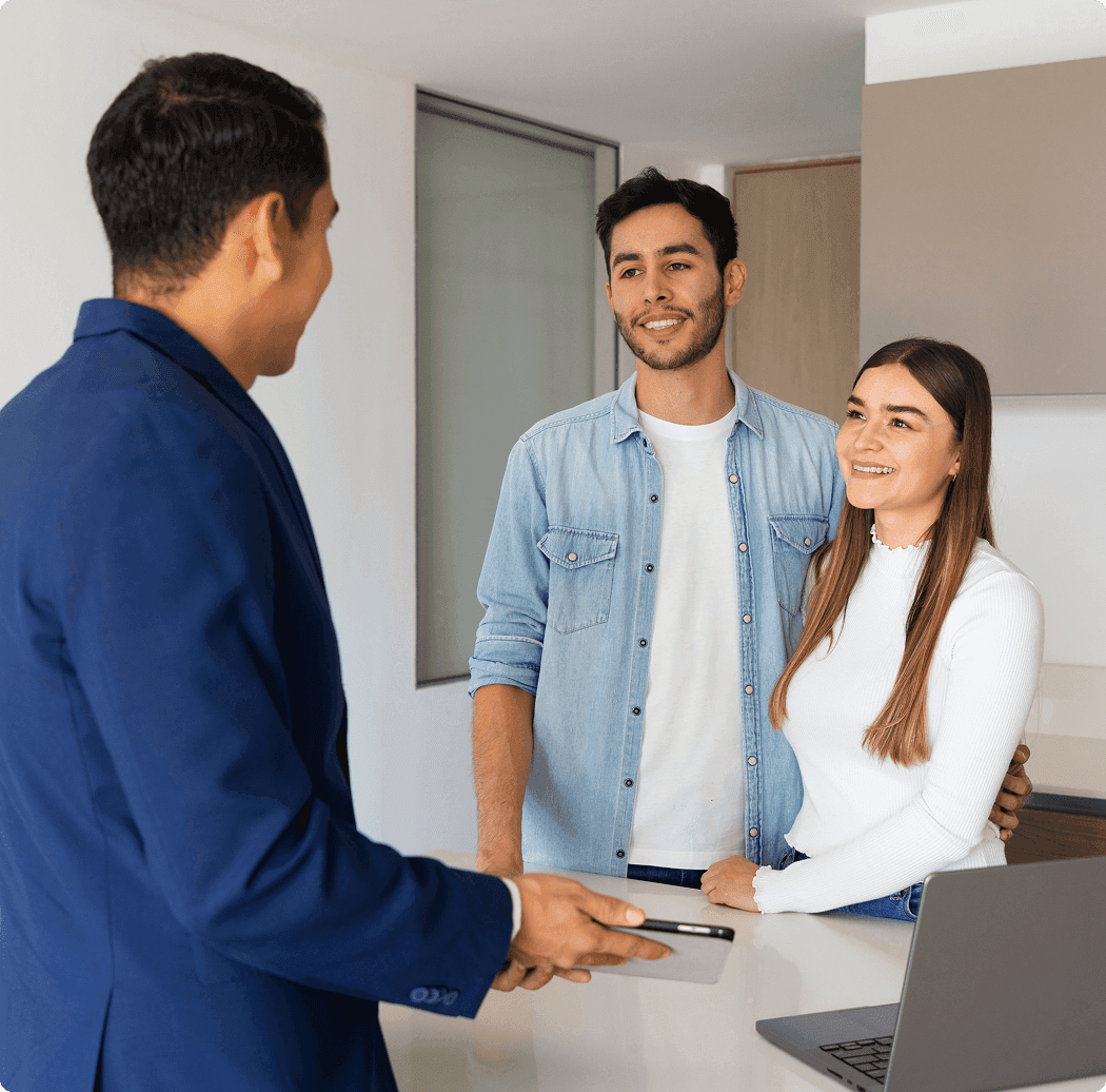 A property manager showing an ipad to two tenants