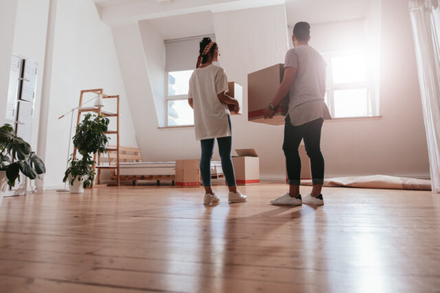 Young couple moving in new house Young couple moving in new house