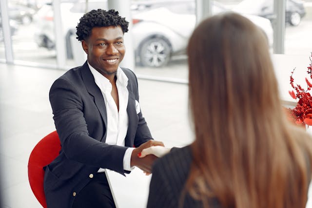 two-people-meeting-shaking-hands