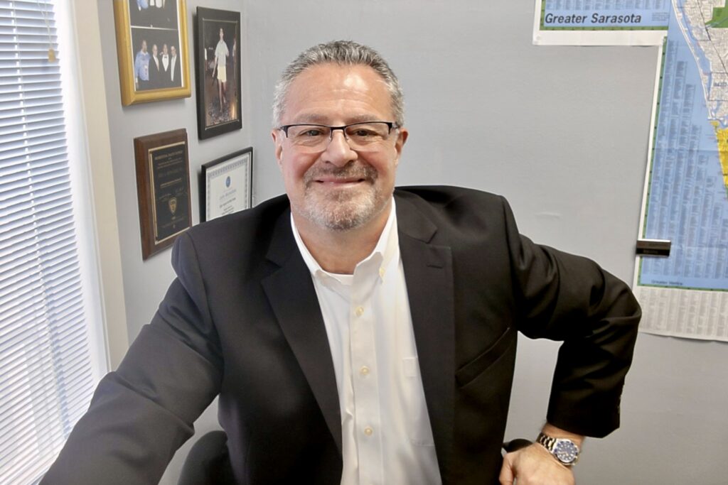 John Michailidis, MSIRE, JD, owner of Real Property Management of Sarasota & Manatee