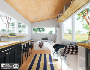 Tiny home kitchen with a sink, stove, and counter, designed for functionality in a small living space.