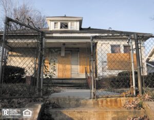 A worn down, uninhabitable home awaiting renovations.