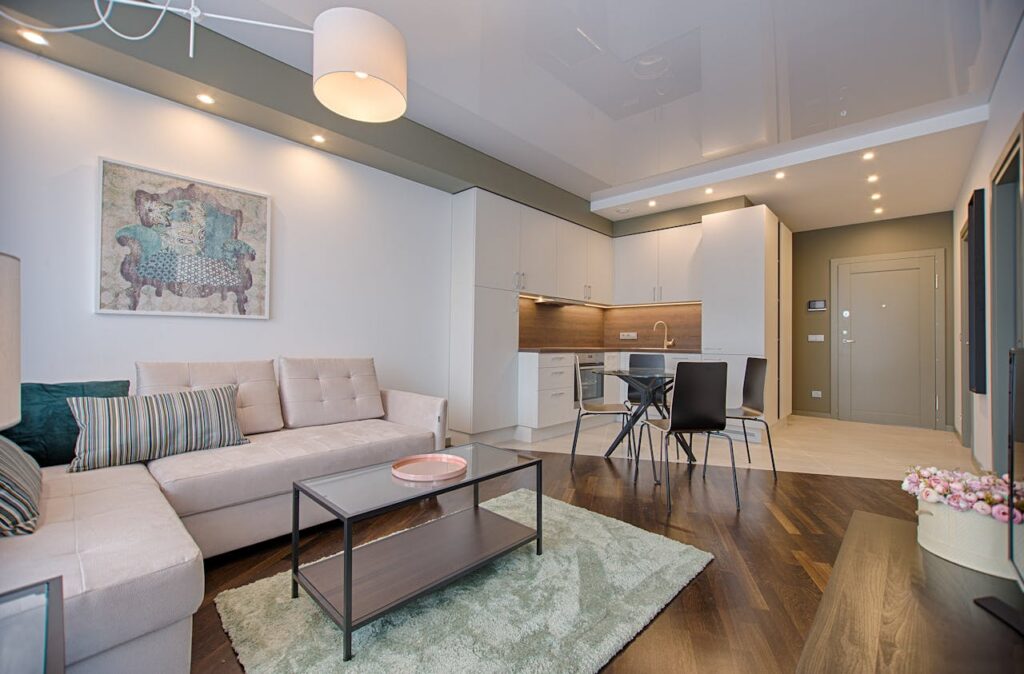 home interior with brown floors and white cabinets