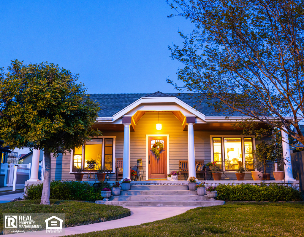 A Craftsman Bungalow home with a fresh coat of paint in twilight.