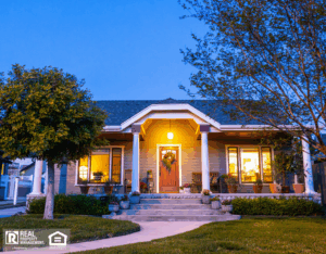 A Craftsman Bungalow home with a fresh coat of paint in twilight.