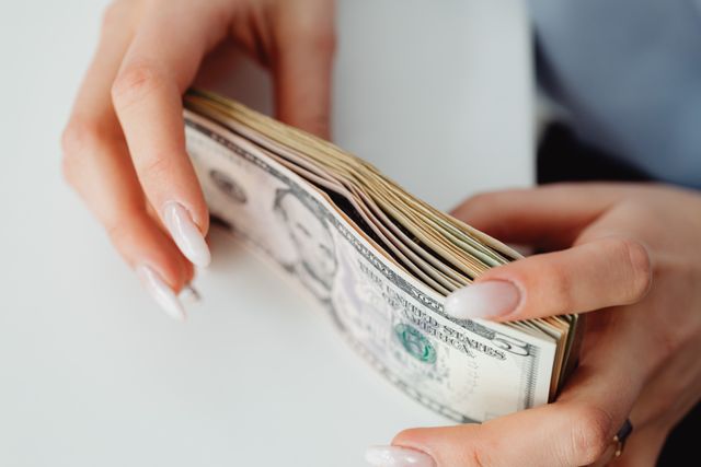 person holding money