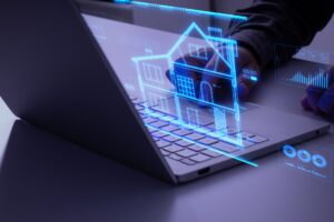 Person interacting with holographic blueprint of a house in blue color hovering above a laptop.