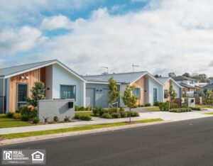 Row of single story newly developed houses.