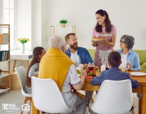 Multi-generational family is celebrating at festive table with delicious food.