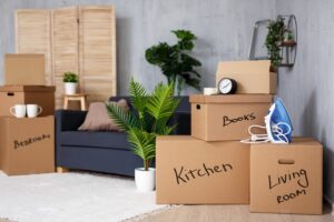 Moving boxes with labels in a home.