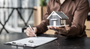 Property manager explaining rental management fees and services to a property owner in Orange County