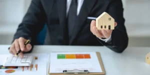Professional property manager meeting with rental property owners in South Orange County