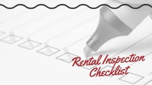 Property manager conducting a move-out inspection at an Orange County rental home.