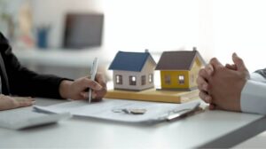 Property manager reviewing owner reports and rental performance for an Irvine investment property.