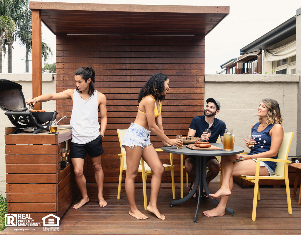 Delafield Tenants Enjoying the Deck in the Backyard