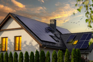 a house with solar panels in the evening