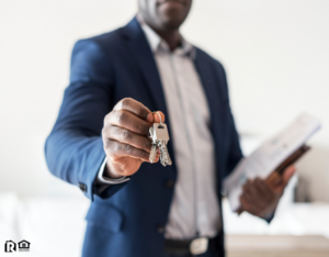 Lewisville Real Estate Investor Holding Out a Set of Keys