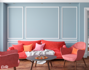 Coral Chairs in Front of a Powder Blue Wall