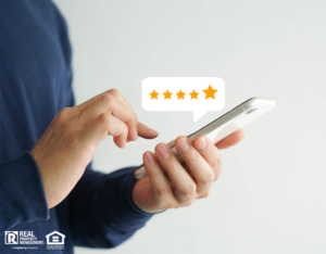 Round Rock Renter Writing a 5-Star Review on Their Phone