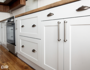 Stylish Gray Fixtures on White Kitchen Cabinets